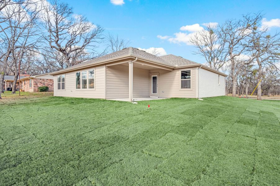 Exterior details and patio area of a home in Runaway Bay, Runaway Bay (Image 22).