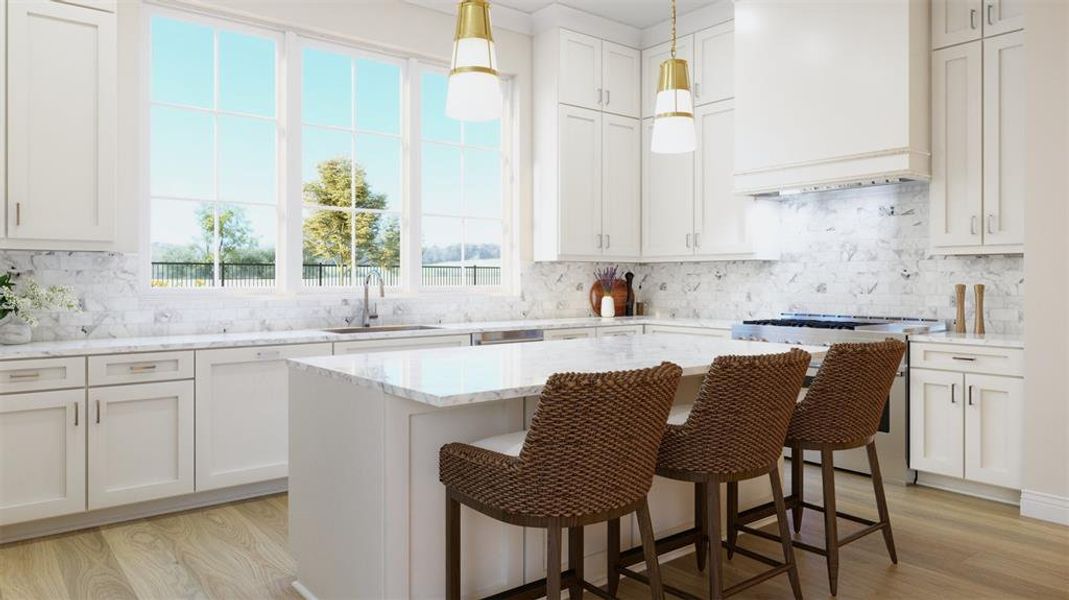 Kitchen with stove, custom range hood, sink, backsplash, and light hardwood / wood-style flooring