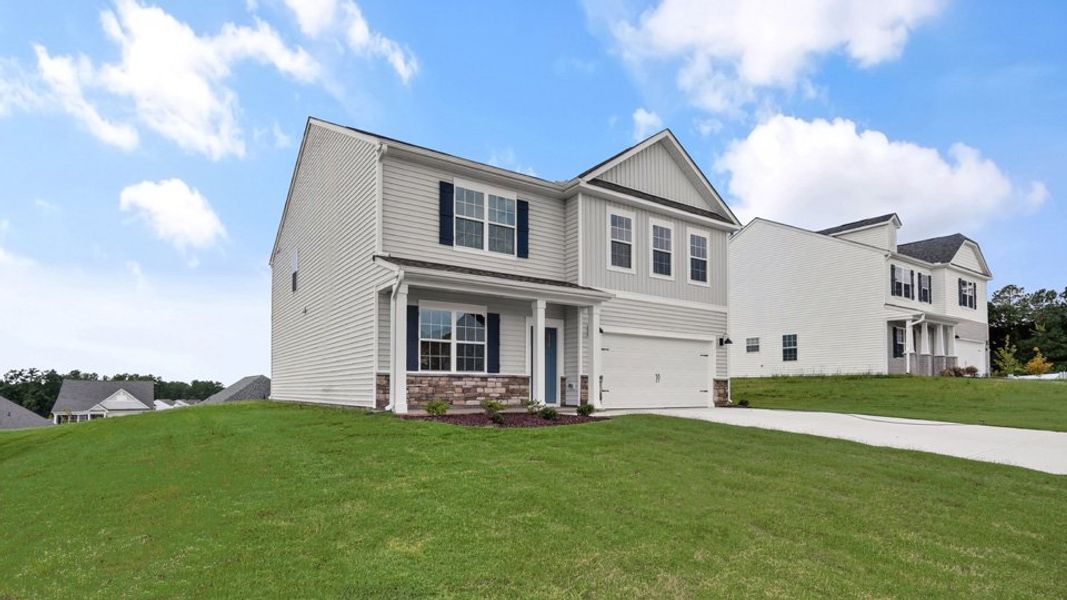 Representative exterior photo of a completed home built from the Hanover - Tradition by D.R. Horton in Collinswood, Aberdeen, NC (Image 24). Representative exterior photo of a completed home built from the Hanover - Tradition by D.R. Horton in Collinswood, Aberdeen, NC (Image 24).