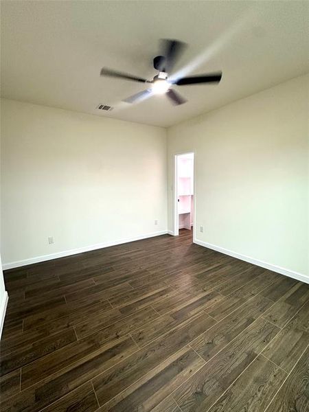 Spare room with ceiling fan