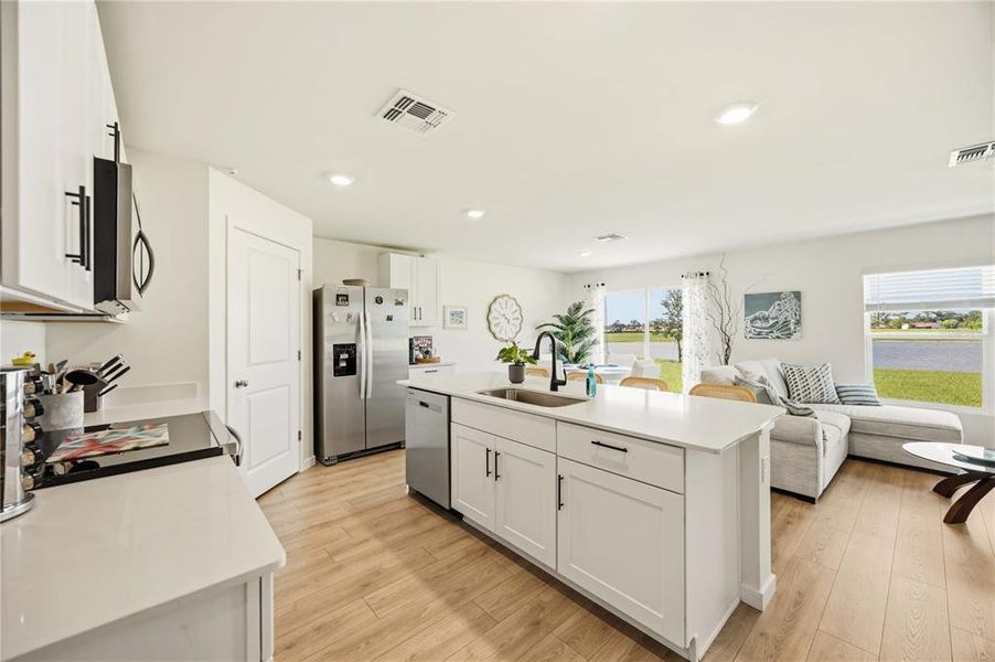 Furnished interior view inside a new home in Central Parc, North Port (Image 14).