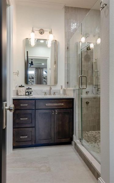 Bathroom with vanity and an enclosed shower
