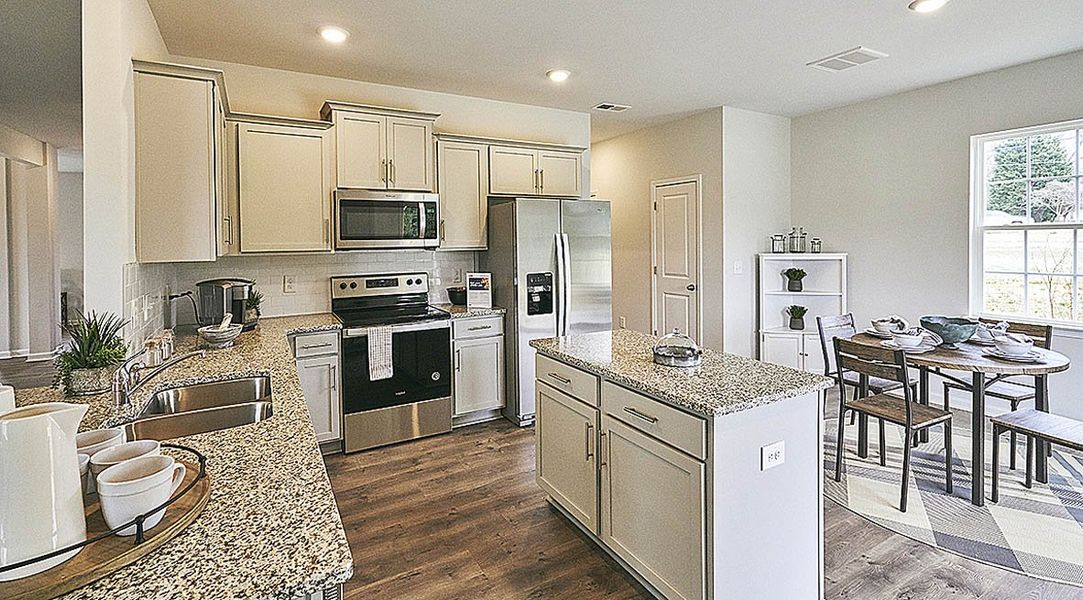 Representative furnished interior of a home built from the WILMINGTON by D.R. Horton in Cedar Oaks, Greensboro (Image 5). Representative furnished interior of a home built from the WILMINGTON by D.R. Horton in Cedar Oaks, Greensboro (Image 5).
