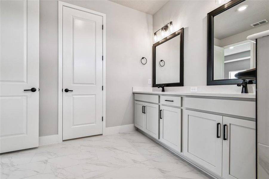 Furnished interior view inside a new home in North River Ranch – Garden Series, Parrish (Image 29). Furnished interior view inside a new home in North River Ranch – Garden Series, Parrish (Image 29).