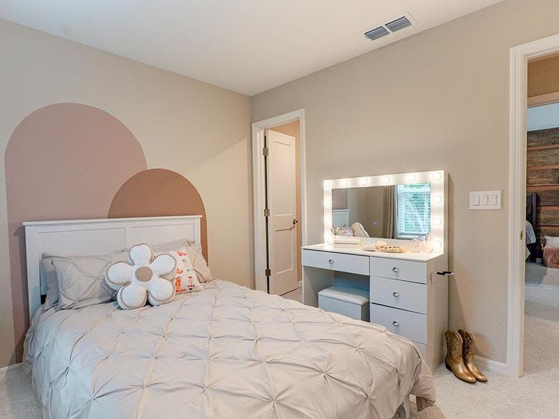 Secondary bedrooms provide space for everyone in your household - Birch townhome by Highland Homes Secondary bedrooms provide space for everyone in your household - Birch townhome by Highland Homes