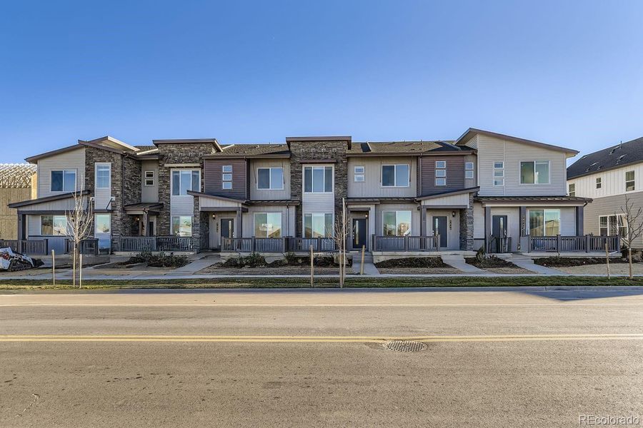 Condo located in Centennial, CO showcasing its design and architecture (Image 1).