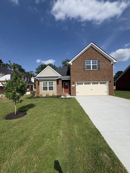 Front exterior of a new home in Rookers Bend, Smyrna, TN, highlighting curb appeal (Image 1). Front exterior of a new home in Rookers Bend, Smyrna, TN, highlighting curb appeal (Image 1).