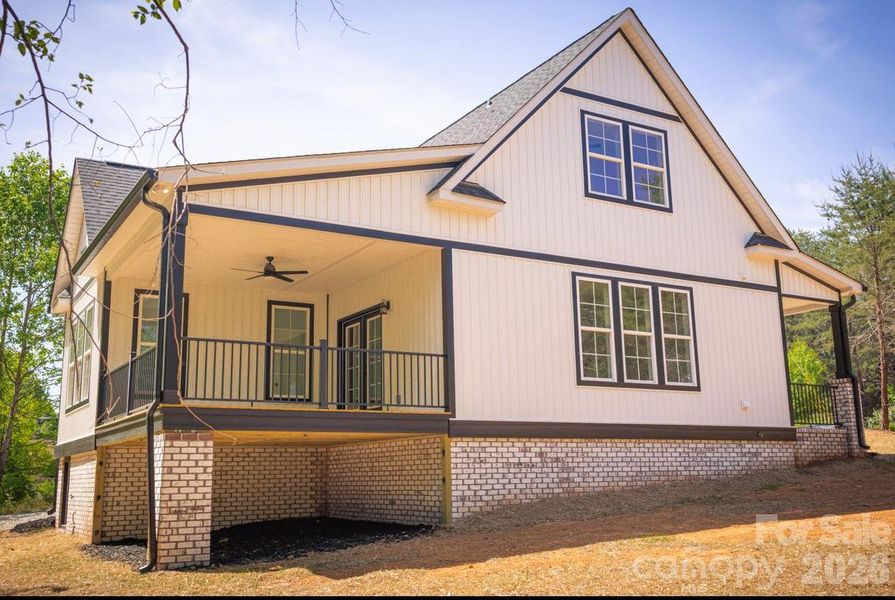 Exterior details and patio area of a home in , Oakboro (Image 26).