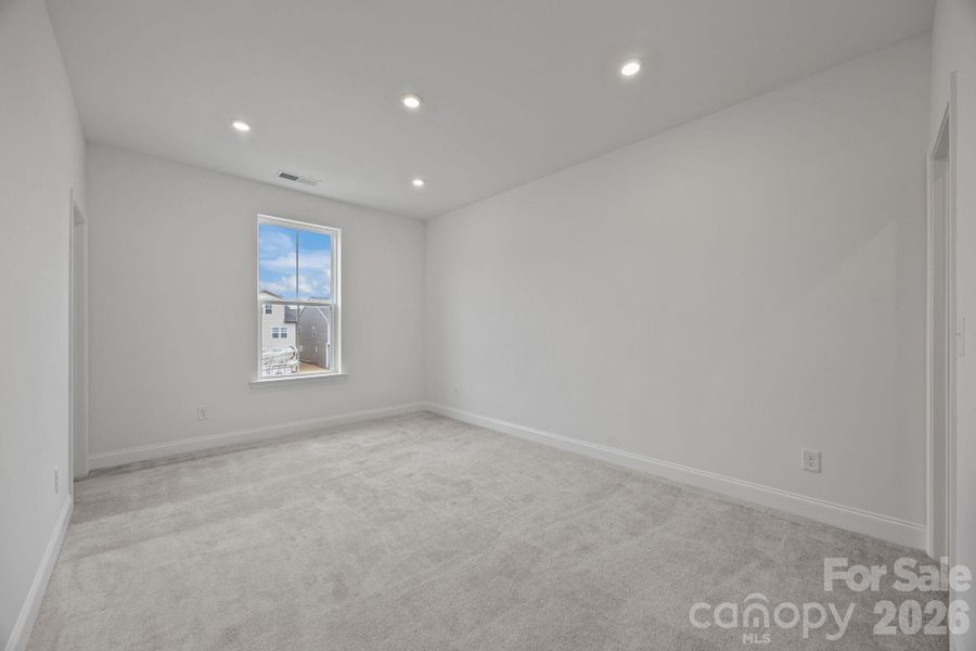 Spacious, unfurnished interior of a new home in The River District Townhomes, Charlotte (Image 21).