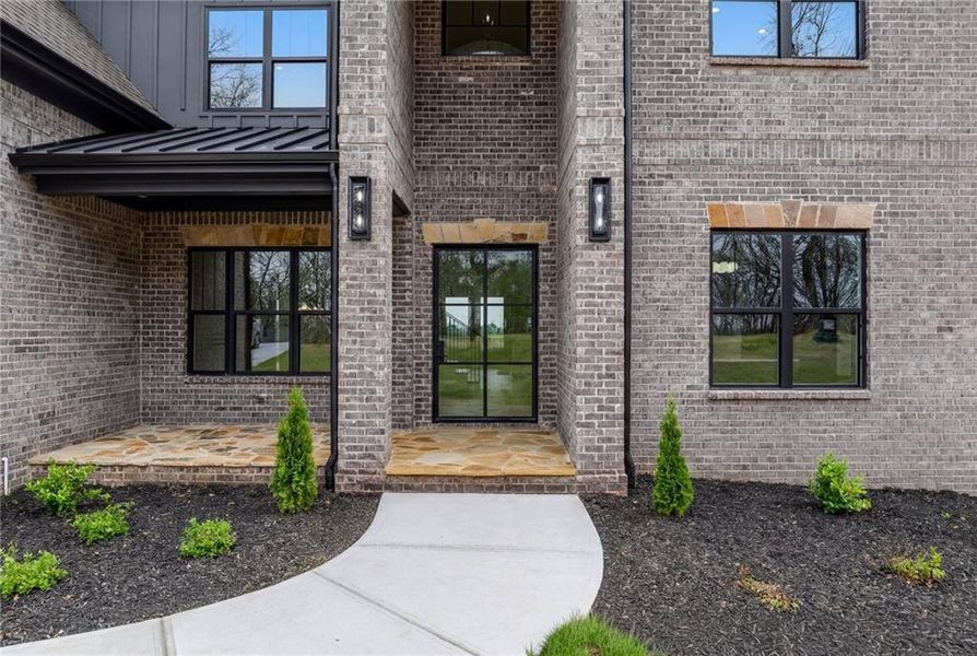 Exterior details and patio area of a home in , Buford (Image 24).