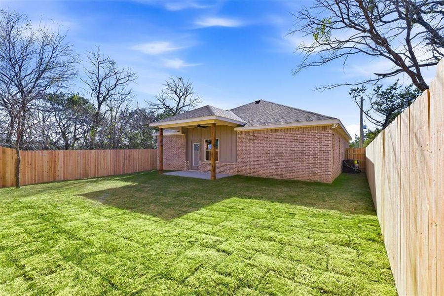 Exterior details and patio area of a home in , Granbury (Image 24).