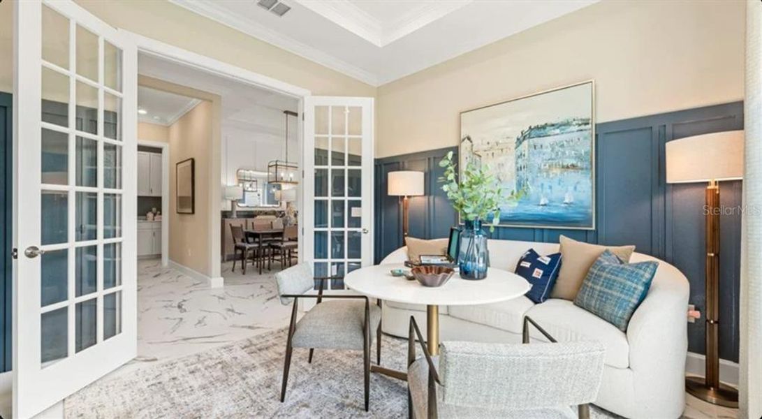 Furnished interior view inside a new home in Esplanade at Wellen Park, Englewood (Image 7).