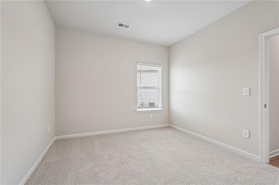 Spacious, unfurnished interior of a new home in Northwoods at Mirror Lake, Villa Rica (Image 40).