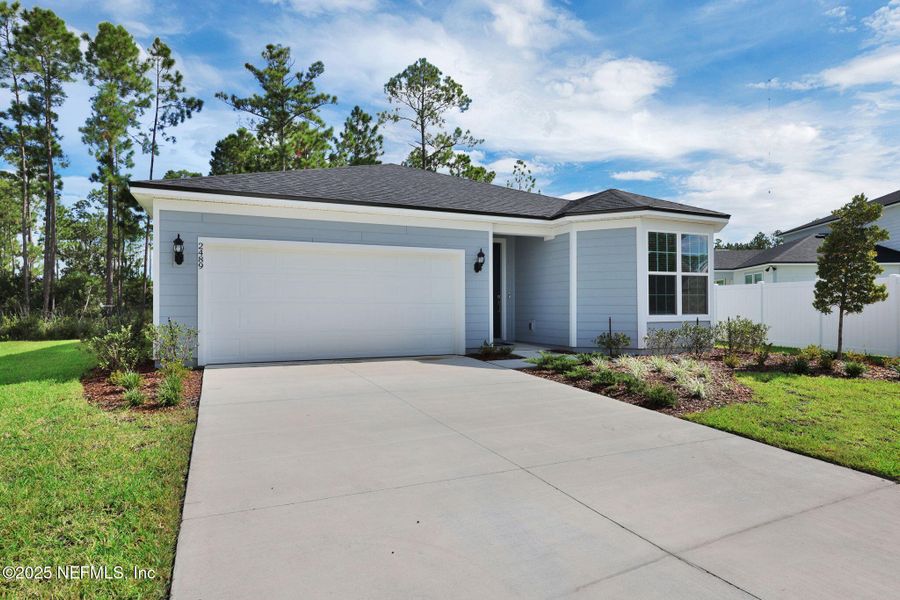 Front exterior of a new home in Bradley Creek, Green Cove Springs, FL, highlighting curb appeal (Image 23). Front exterior of a new home in Bradley Creek, Green Cove Springs, FL, highlighting curb appeal (Image 23).