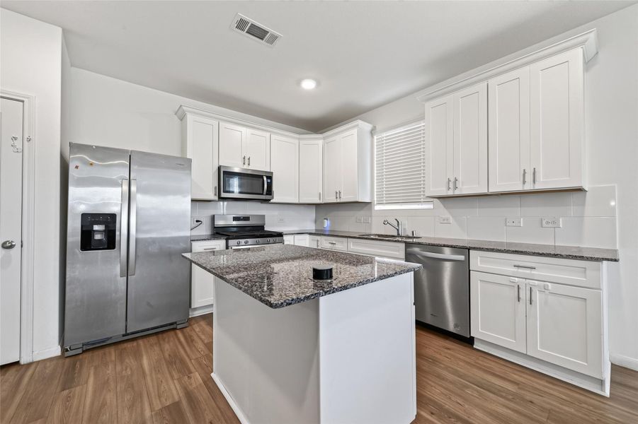 Furnished interior view inside a new home in Marvida, Cypress (Image 7).