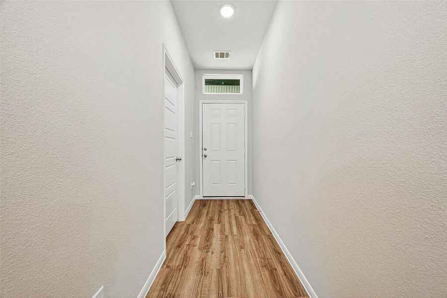 Spacious, unfurnished interior of a new home in Sunterra, Katy (Image 37).