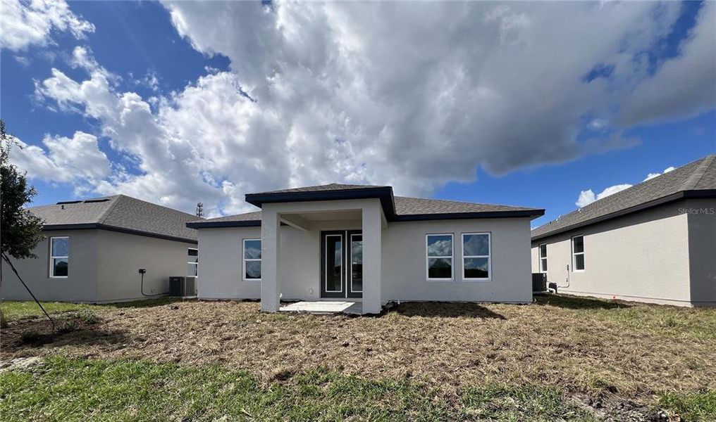 Exterior details and patio area of a home in Hawks Run, Kissimmee (Image 14). Exterior details and patio area of a home in Hawks Run, Kissimmee (Image 14).