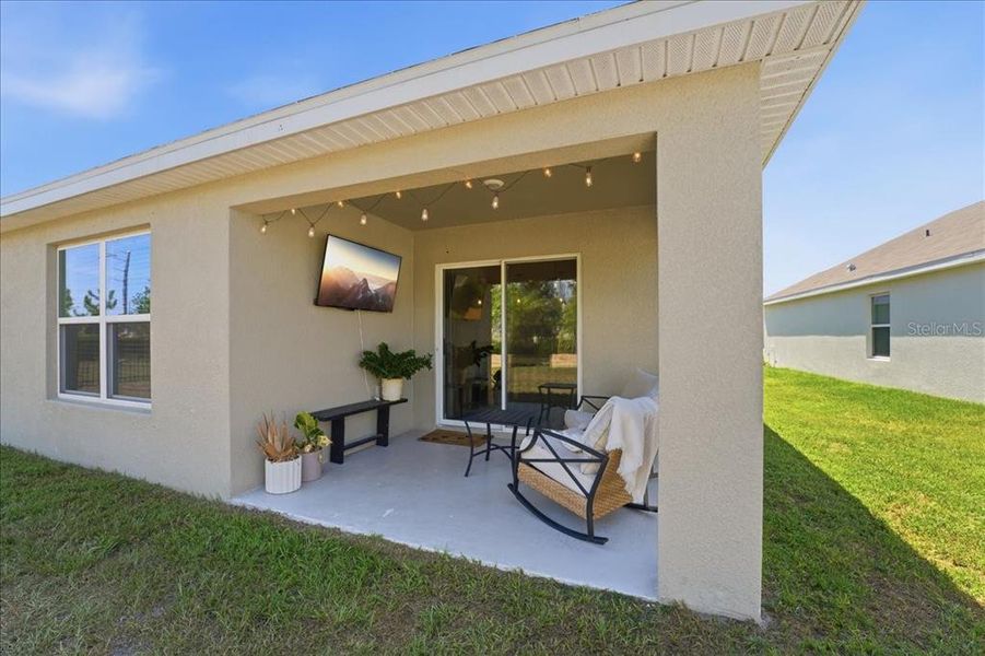 Exterior details and patio area of a home in Bella Lago, Parrish (Image 20).