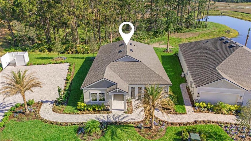 Front exterior of a new home in Reserve East, Flagler Beach, FL, highlighting curb appeal (Image 19).