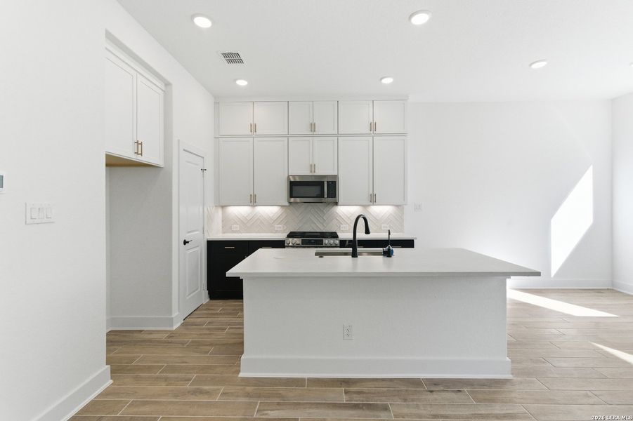 Furnished interior view inside a new home in Rose Hill, San Antonio (Image 12).