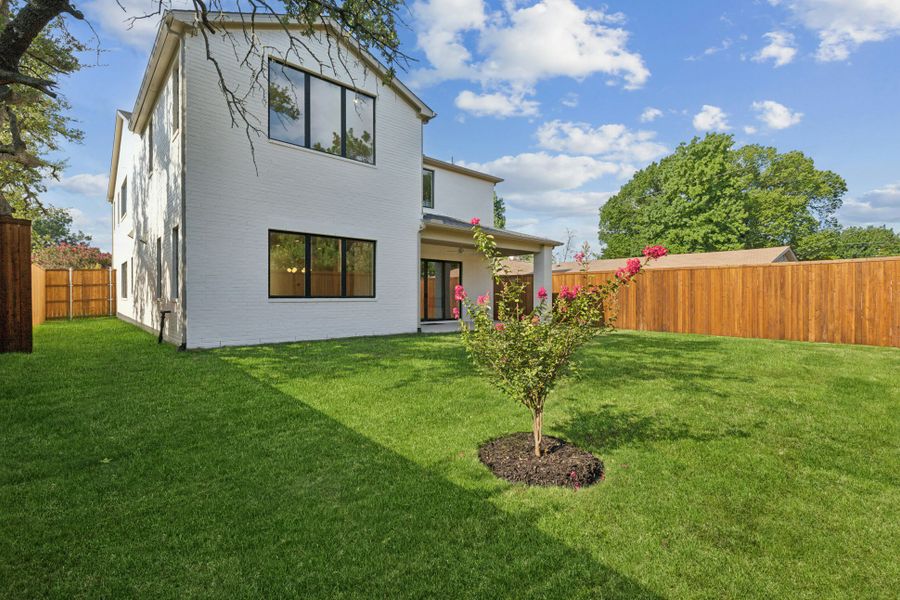 Front exterior of a new home in , Dallas, TX, highlighting curb appeal (Image 43).