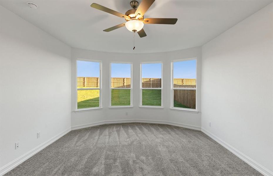 Elegant owner's suite with Bay window *real home pictured