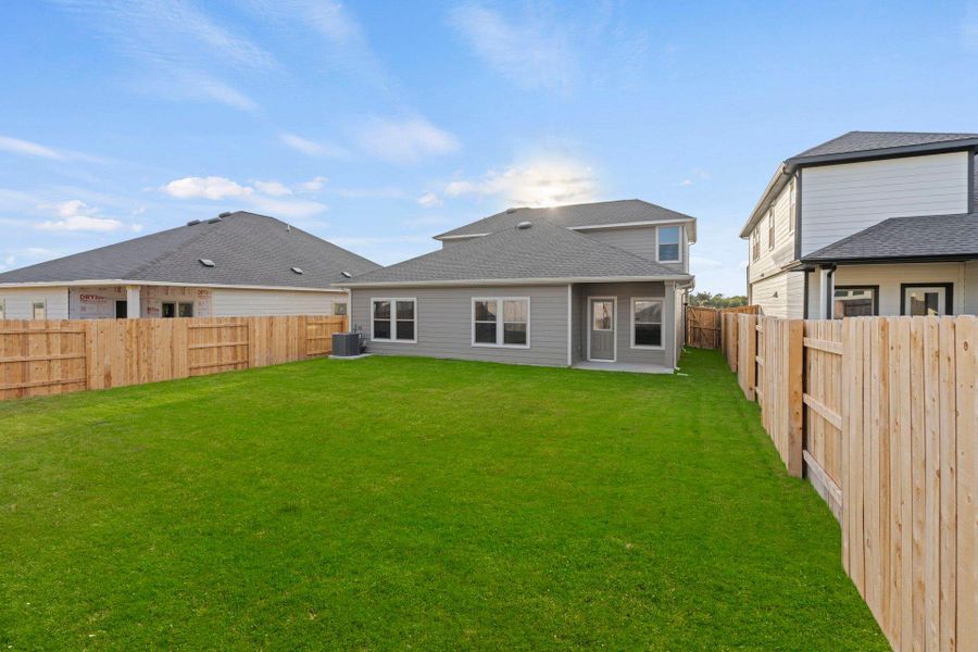 Rear of Home and Private Backyard