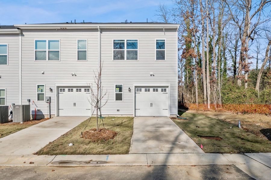 Exterior details and patio area of a home in Lakeview Village, Charlotte (Image 2). Exterior details and patio area of a home in Lakeview Village, Charlotte (Image 2).