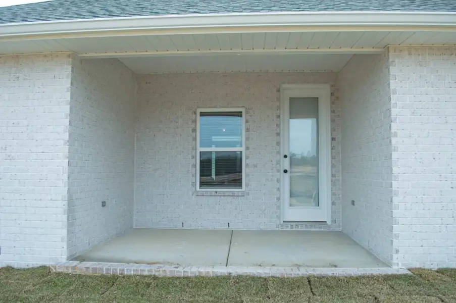 Exterior details and patio area of a home in Parkland Place, Pace (Image 24).