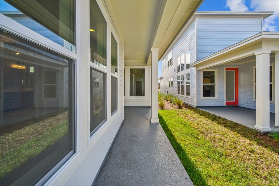Exterior details and patio area of a home in Weslyn Park in Sunbridge 34', St. Cloud (Image 4). Exterior details and patio area of a home in Weslyn Park in Sunbridge 34', St. Cloud (Image 4).