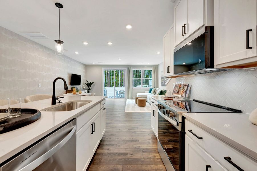 Representative furnished interior of a home built from the Hallie by Mattamy Homes in Ashmore Townes, Garner (Image 6). Representative furnished interior of a home built from the Hallie by Mattamy Homes in Ashmore Townes, Garner (Image 6).