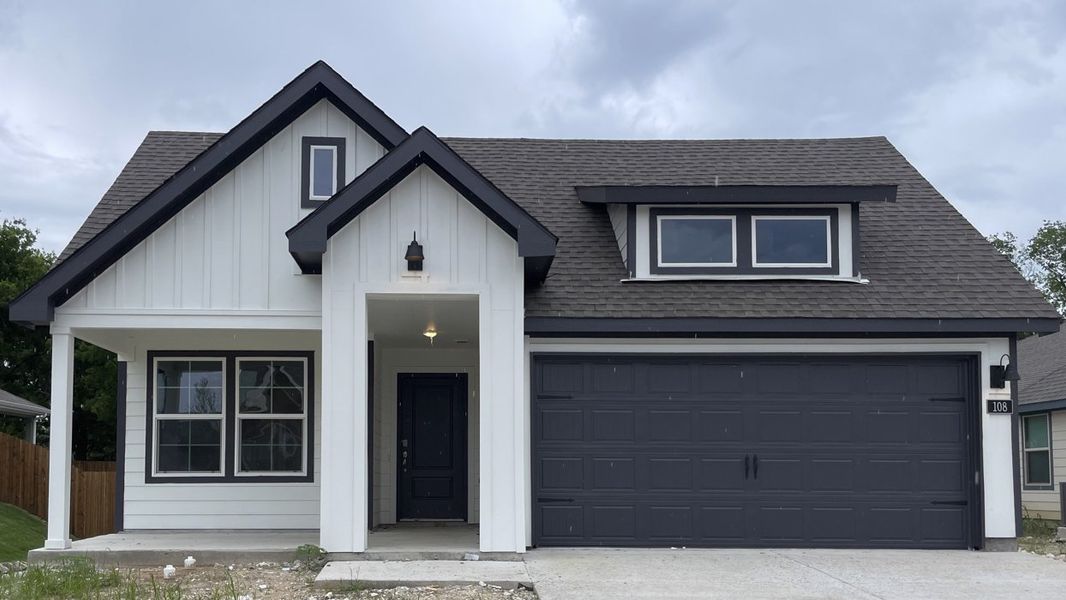 Front exterior of a home in the Lee Heights community, located in Tom Bean, TX (Image 2). Front exterior of a home in the Lee Heights community, located in Tom Bean, TX (Image 2).