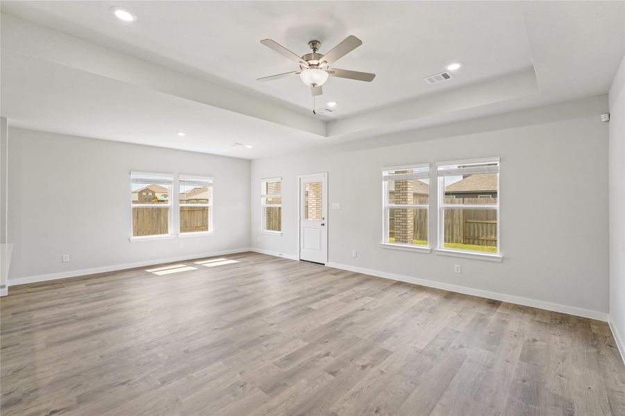Spacious, unfurnished interior of a new home in Sunterra, Katy (Image 18).