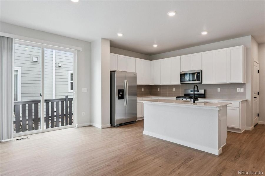 Furnished interior view inside a new home in Paired Homes at Alder Creek, Parker (Image 5). Furnished interior view inside a new home in Paired Homes at Alder Creek, Parker (Image 5).