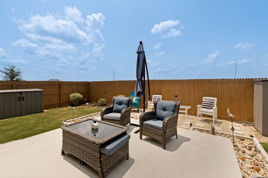 Exterior details and patio area of a home in Weltner Farms 50’s, New Braunfels (Image 3).