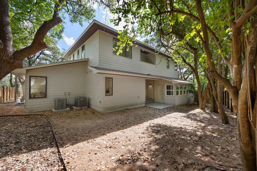 Back of property with a patio area