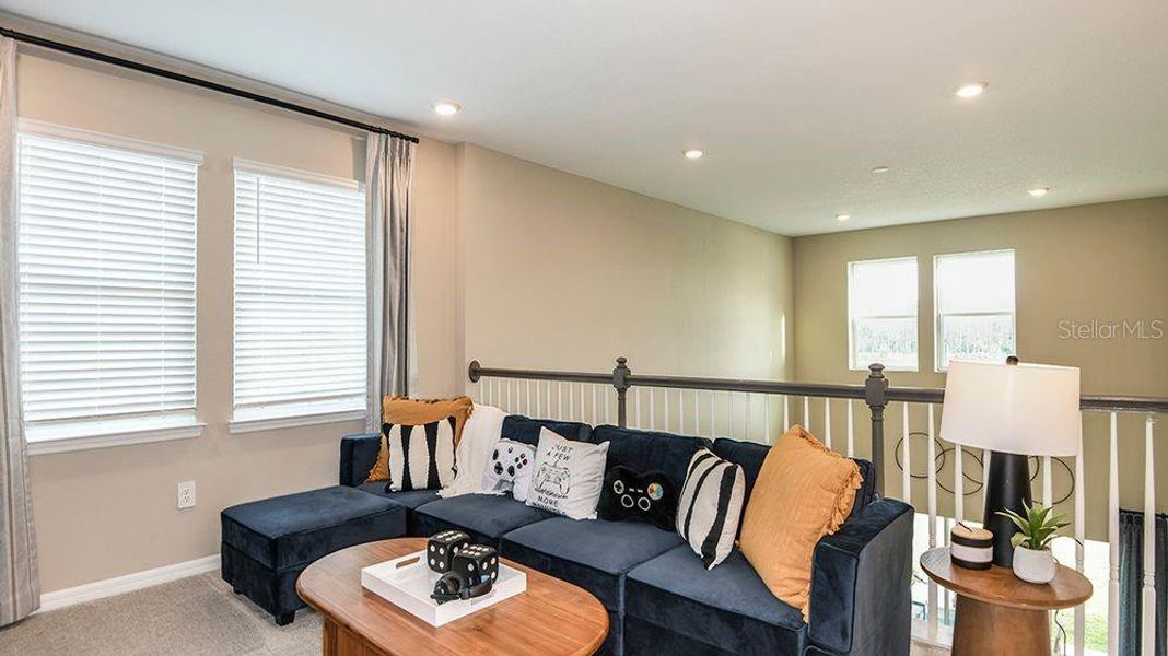 Furnished interior view inside a new home in Westview Community Group Page, Kissimmee (Image 22).