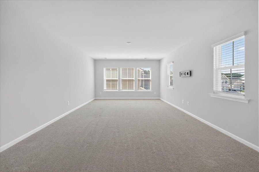 Spacious, unfurnished interior of a new home in Sweetgrass at Summers Corner, Summerville (Image 40).