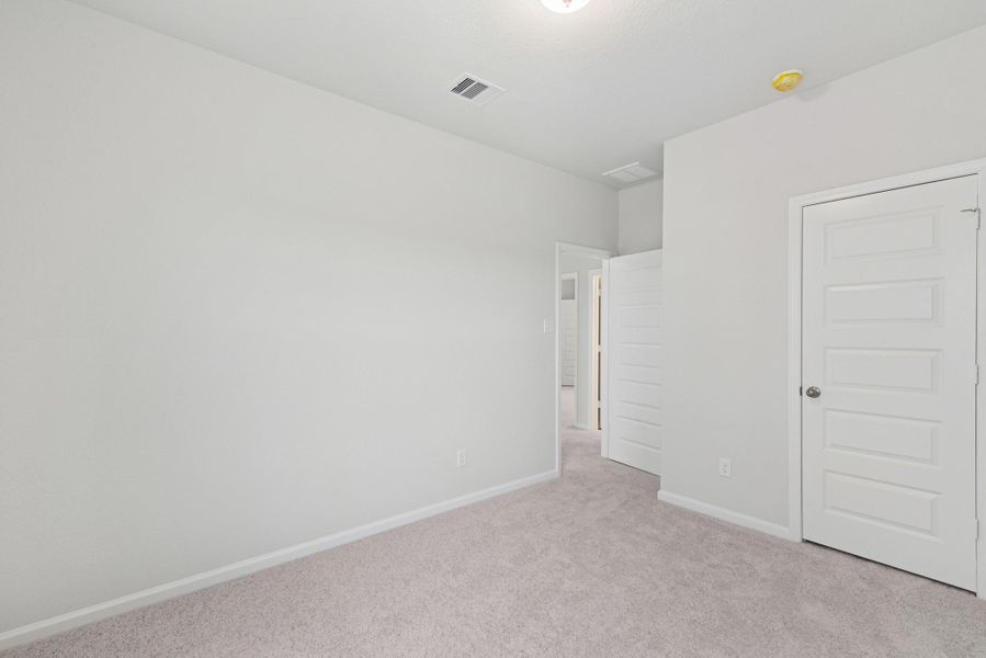 Spacious, unfurnished interior of a new home in The Canopies, Splendora (Image 22).