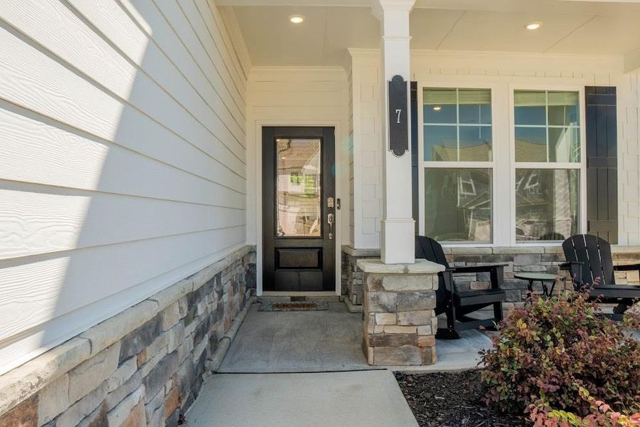 Exterior details and patio area of a home in Park at Ansleigh Farms, Dallas (Image 3).