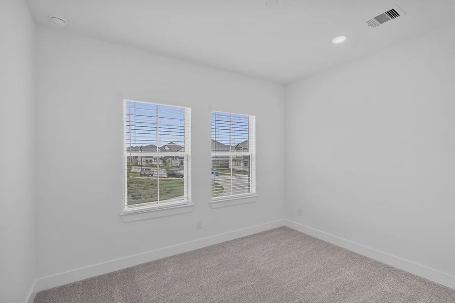Spacious, unfurnished interior of a new home in Bridgeland Courtyard, Cypress (Image 19).