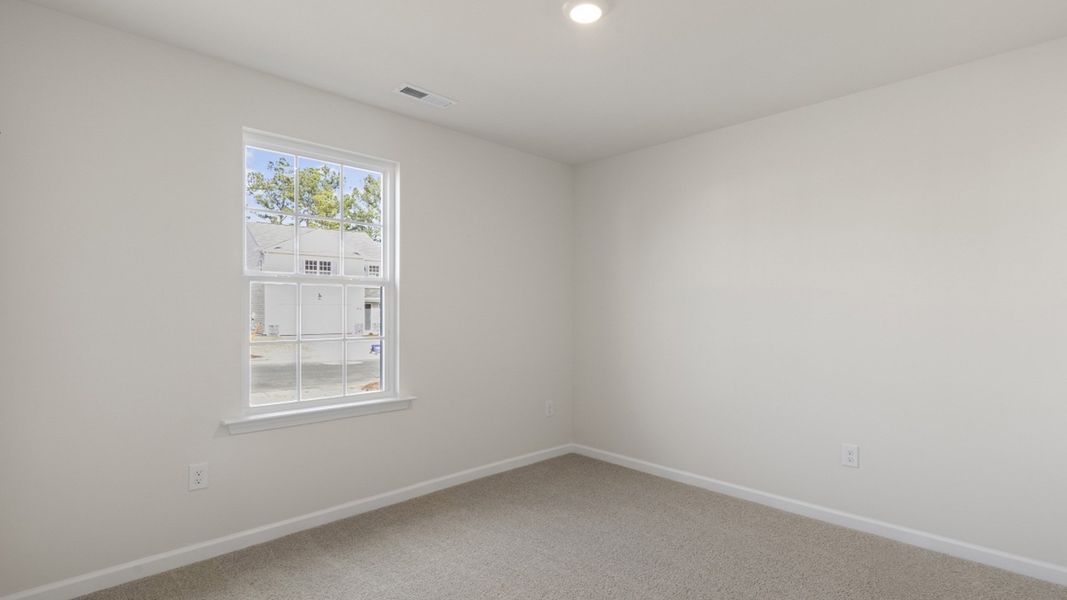 Representative unfurnished interior of a home built from the Freeport by D.R. Horton in Blair Ridge, La Grange (Image 6).