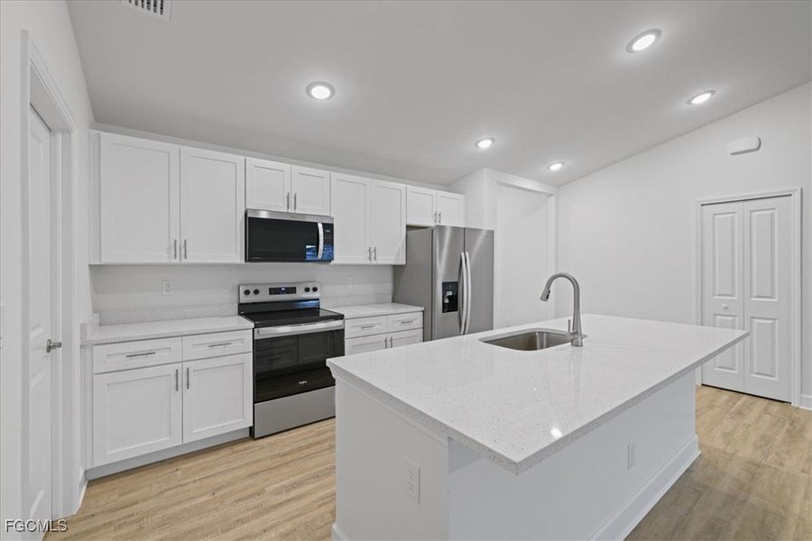 Furnished interior view inside a new home in Cape Coral, Cape Coral (Image 9). Furnished interior view inside a new home in Cape Coral, Cape Coral (Image 9).