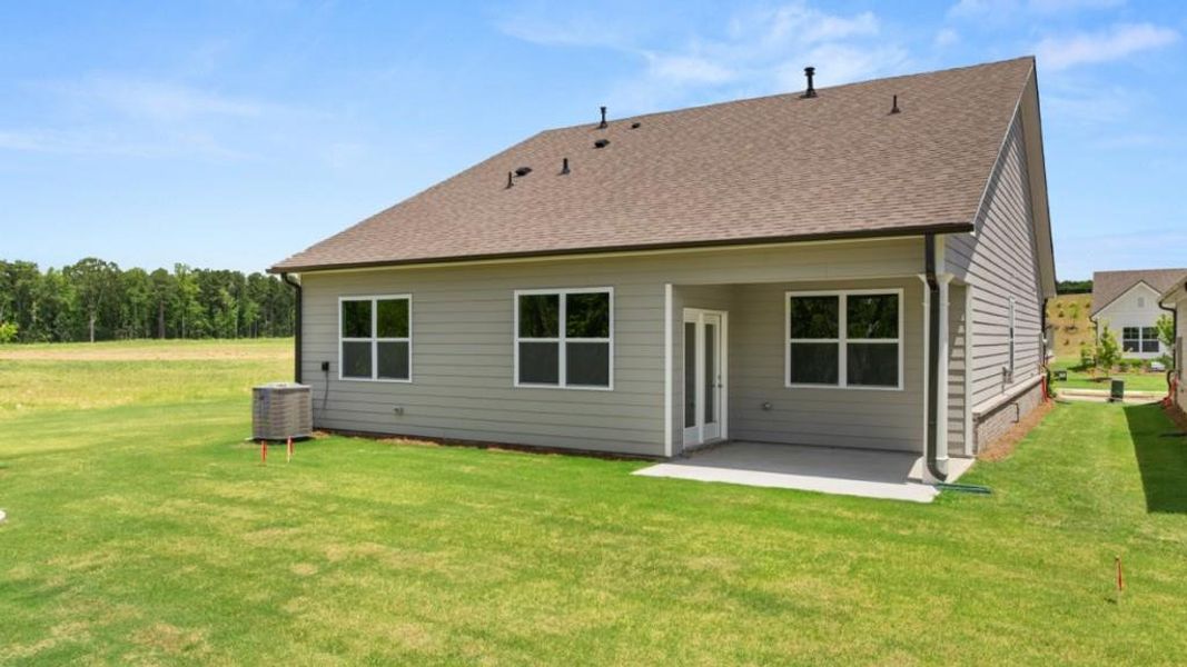 Exterior details and patio area of a home in Hamptons at Riverwood North, Dallas (Image 23).