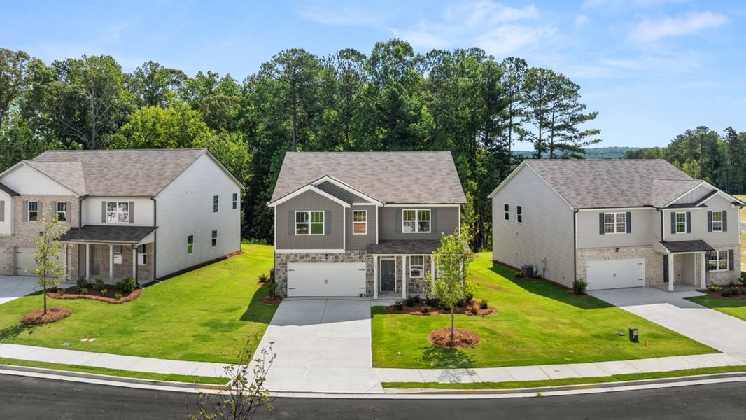Representative exterior photo of a completed home built from the Hanover by D.R. Horton in Northwoods at Mirror Lake, Villa Rica, GA (Image 21).