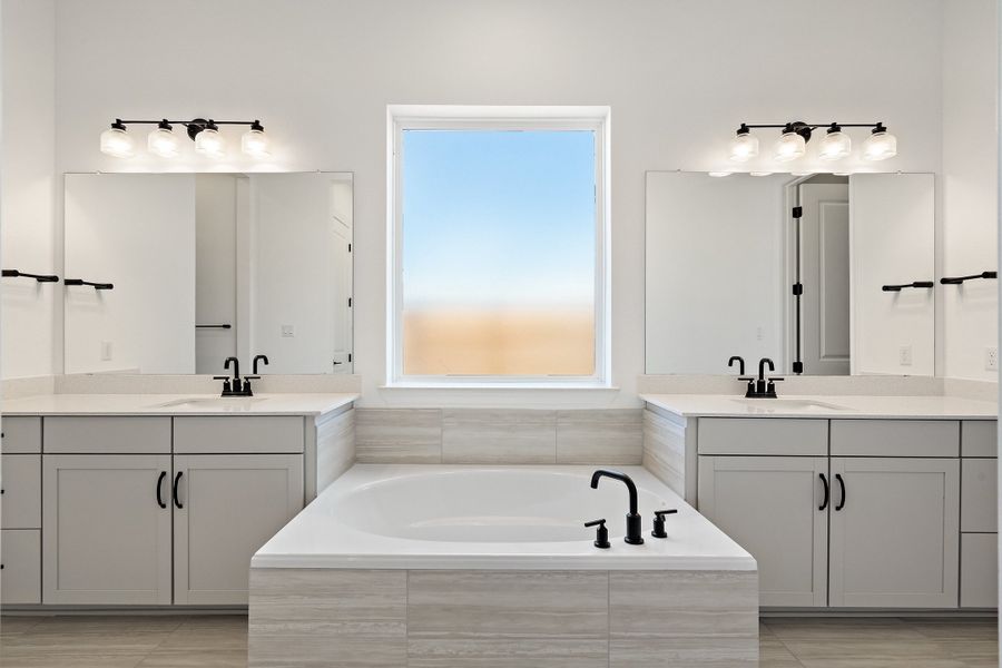 Representative furnished interior of a home built from the Waterville by Ashton Woods in The Trails at Carmel, Pflugerville (Image 18).