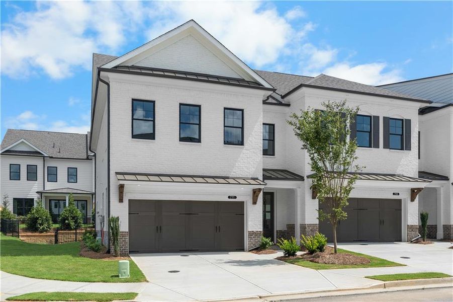 Front exterior of a new home in Millcroft Townhomes, Buford, GA, highlighting curb appeal (Image 2).