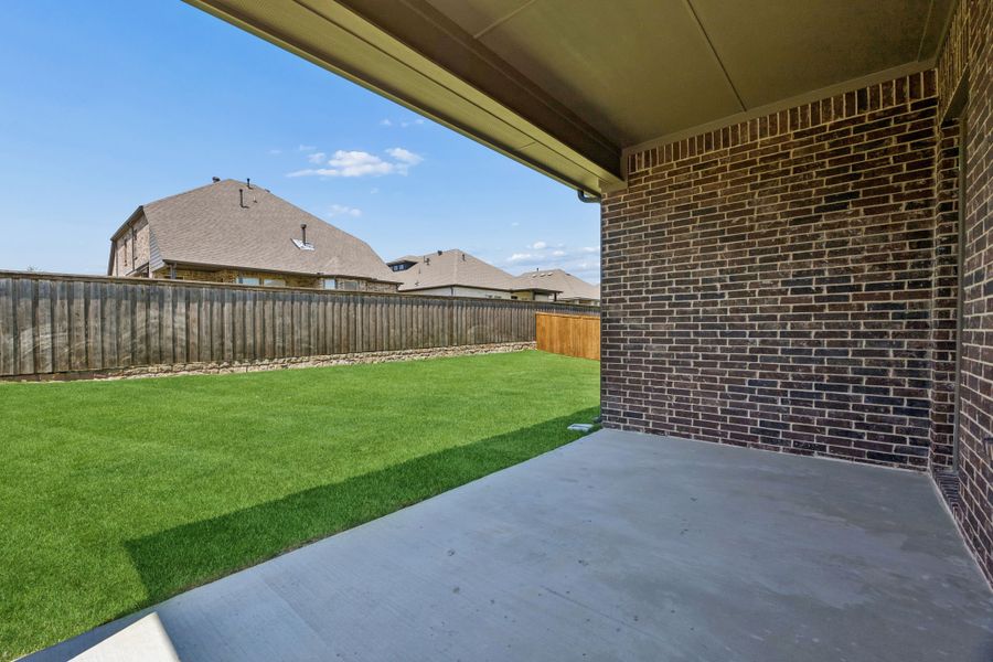 Exterior details and patio area of a home in Mayfield Farms, Arlington (Image 3).