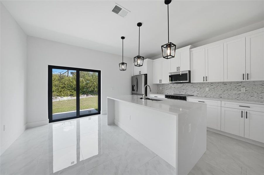 Furnished interior view inside a new home in , Port Charlotte (Image 6).