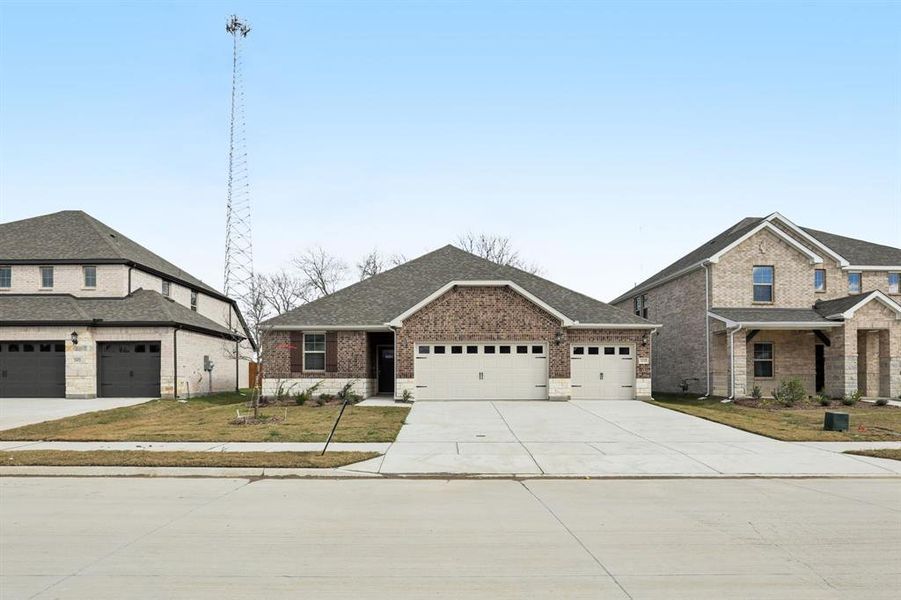 Front exterior of a new home in Parks at Foster Crossing - Premier Series, Anna, TX, highlighting curb appeal (Image 2). Front exterior of a new home in Parks at Foster Crossing - Premier Series, Anna, TX, highlighting curb appeal (Image 2).